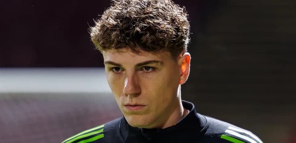 Player focused before the match in training gear