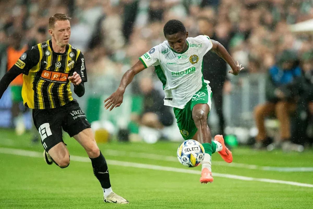 Player dribbling the ball during intense match action