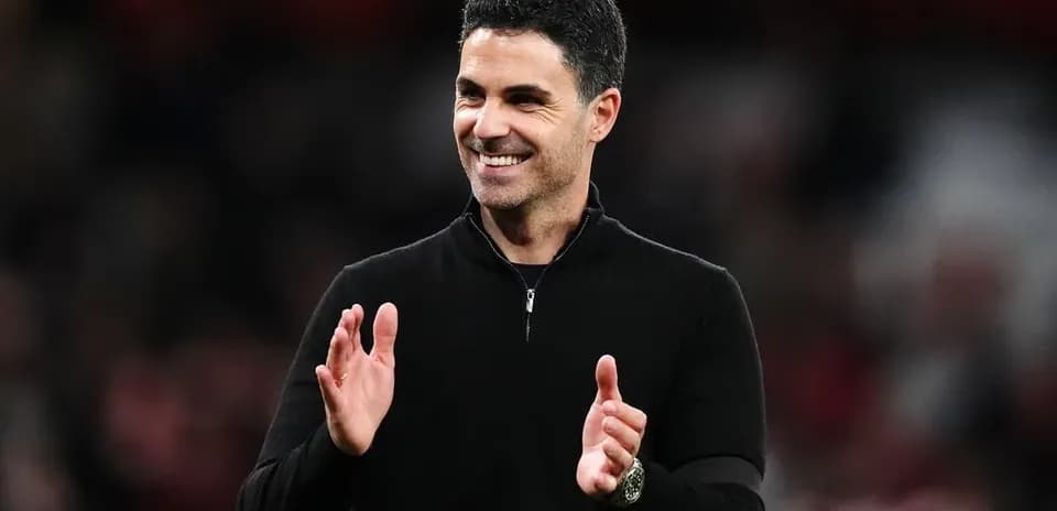Coach applauding during a match celebration