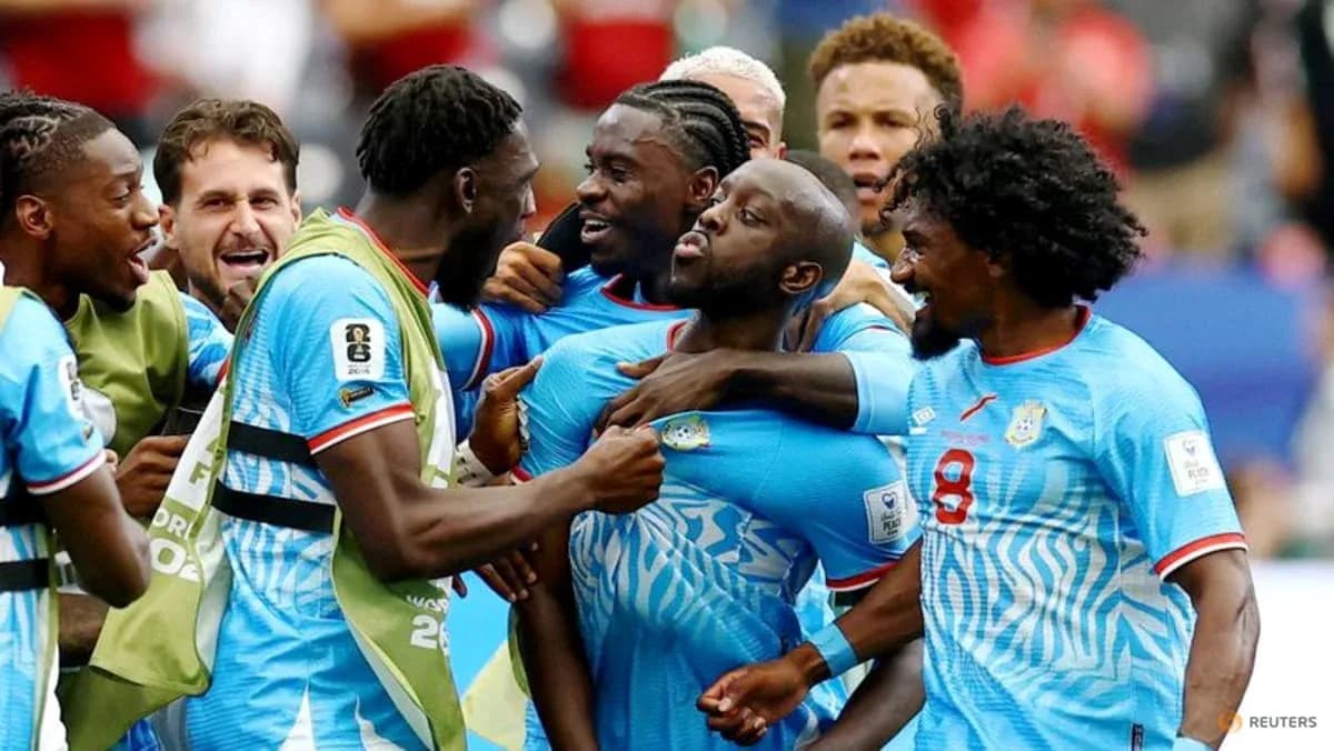 Players celebrating together after a goal