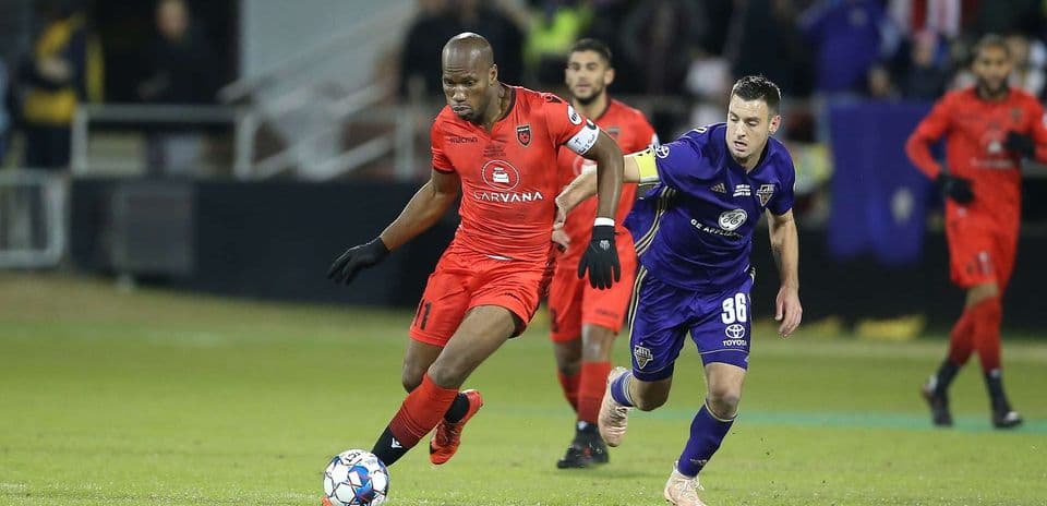 Player dribbling the ball during match
