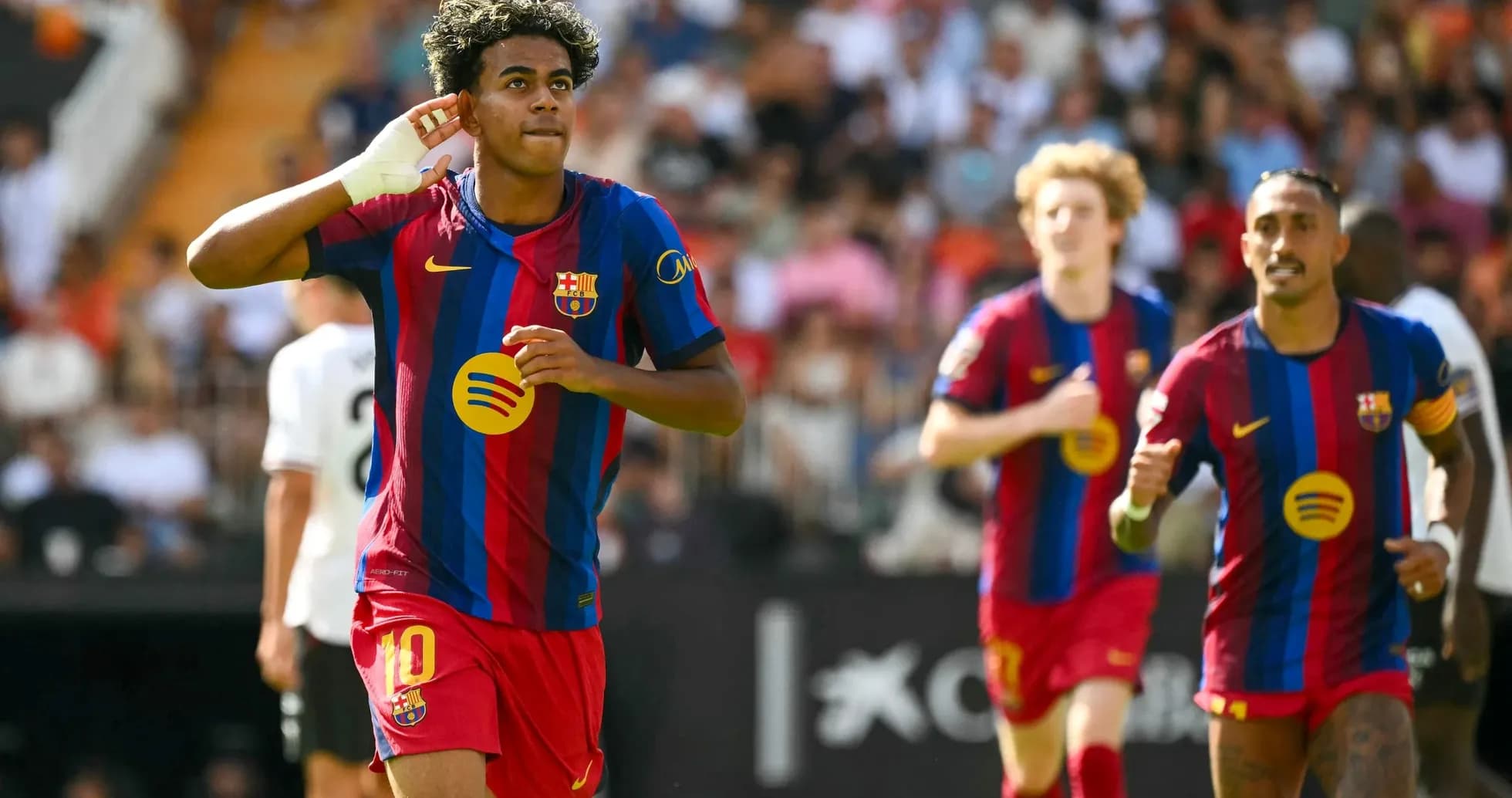 Barcelona players celebrating during La Liga match