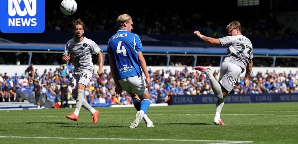 Player attempting a shot on goal during match