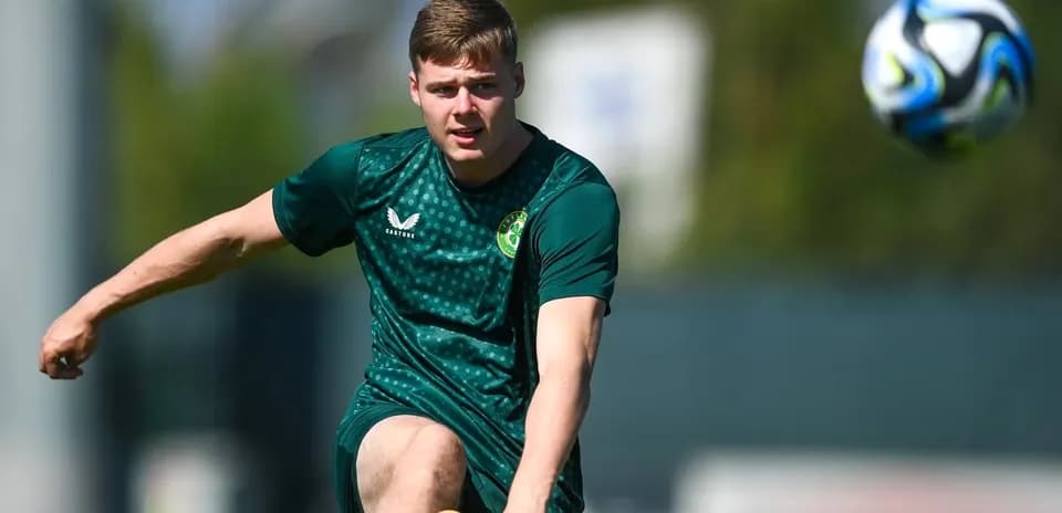 Player kicking a soccer ball during training session