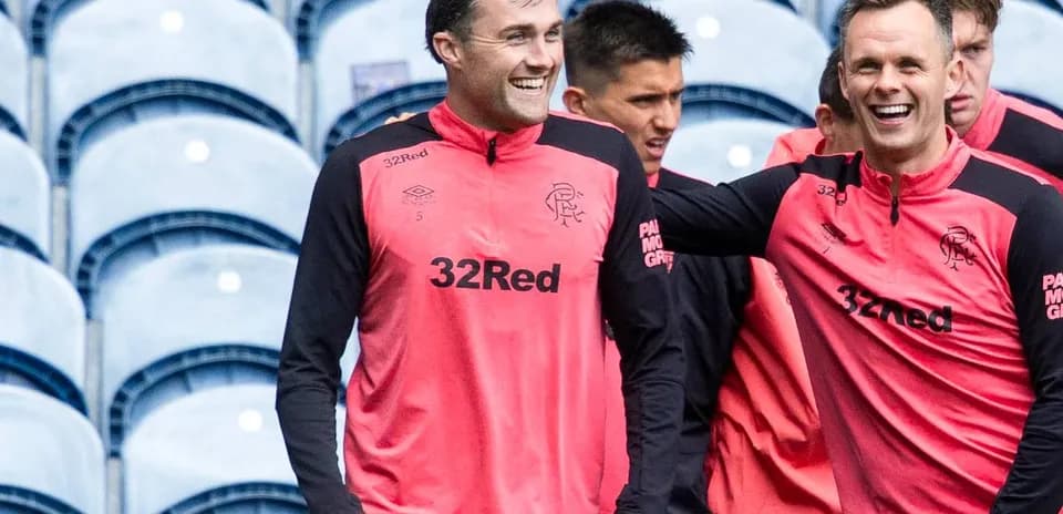 Players training together in pink team kits