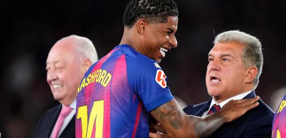 Marcus Rashford interacting with club officials after match