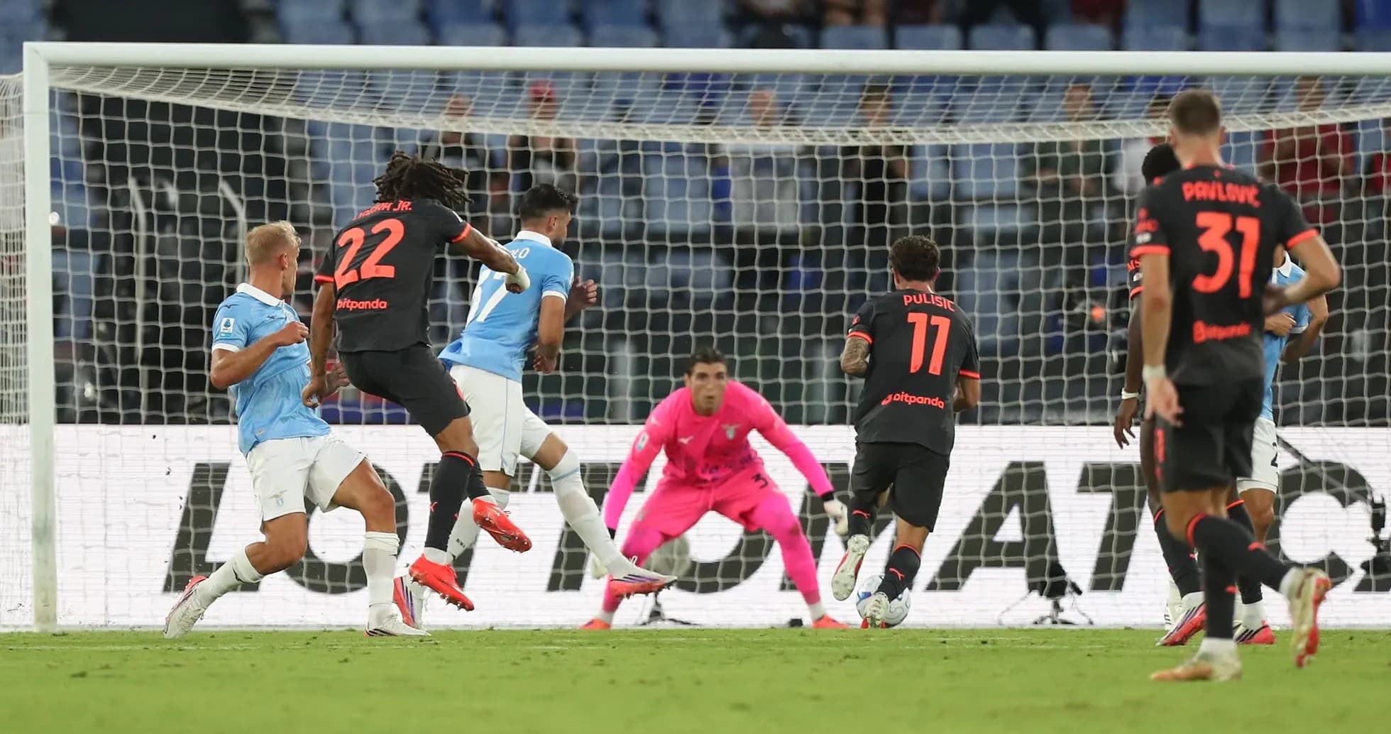 Lazio player shooting on goal during match