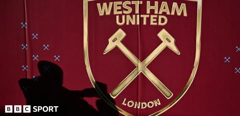 West Ham United logo displayed on a maroon background