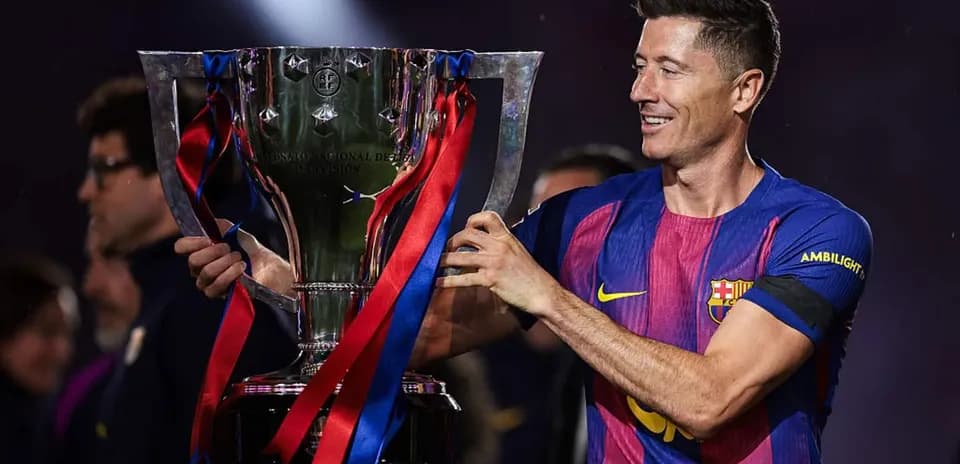 Player holding trophy after winning championship