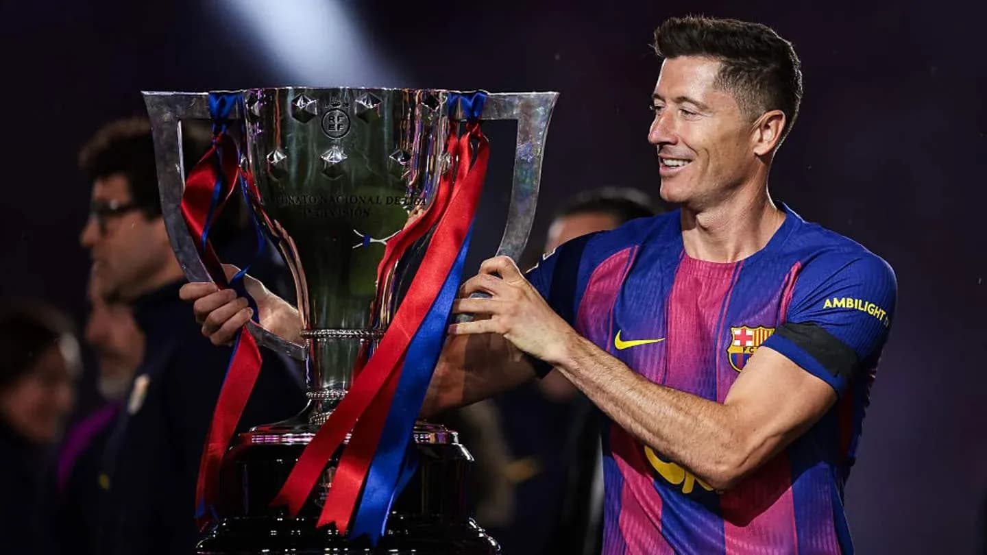 Player holding trophy after winning championship