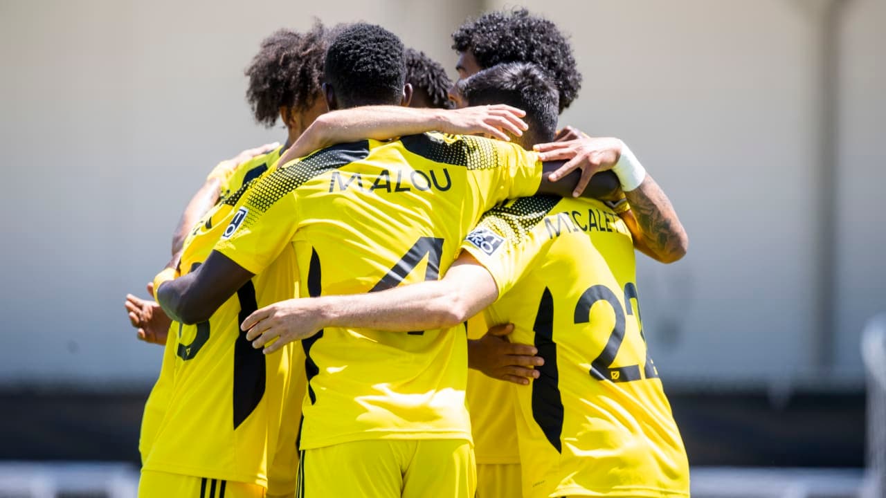 Columbus Crew II players celebrating together
