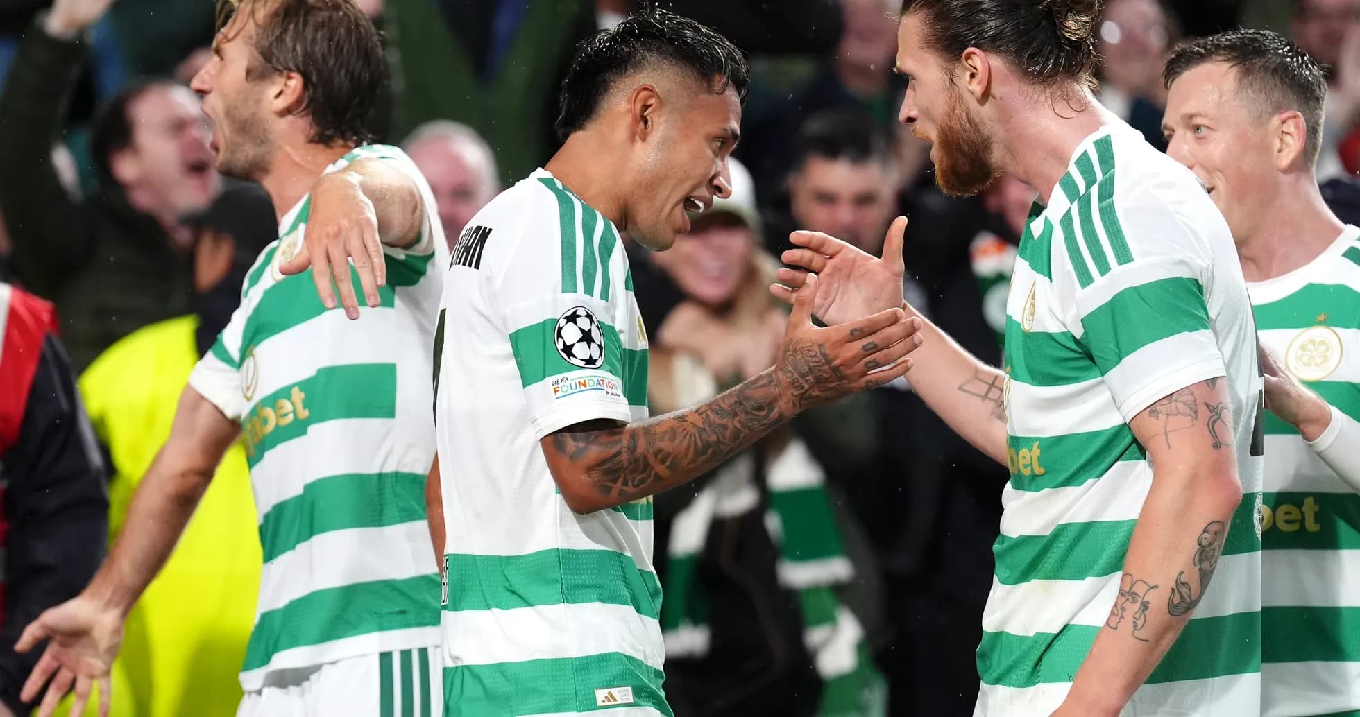 Celtic players celebrating during UEFA Champions League match