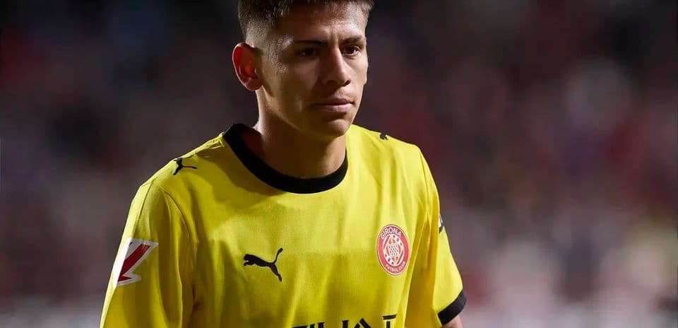 Player wearing yellow kit during match