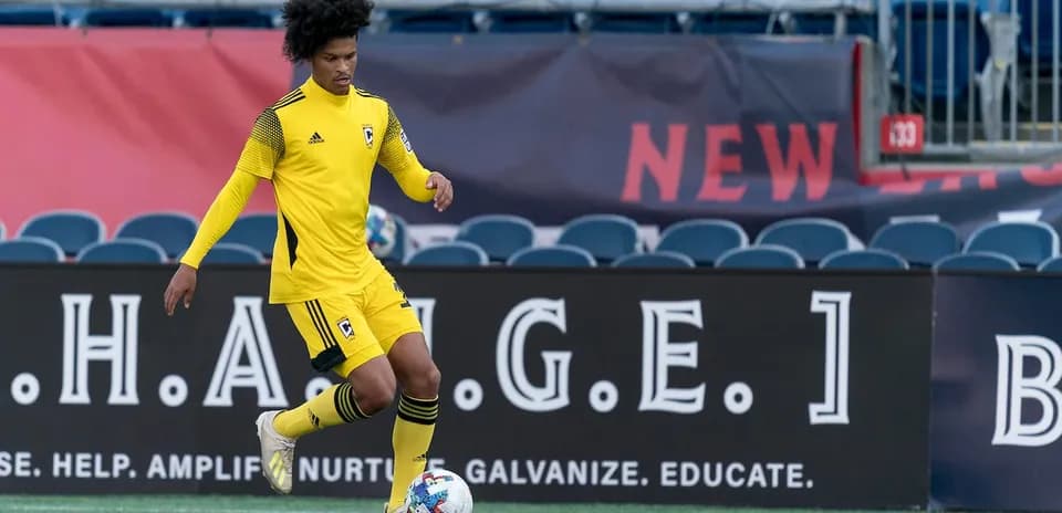 Player in yellow jersey during MLS Next Pro match