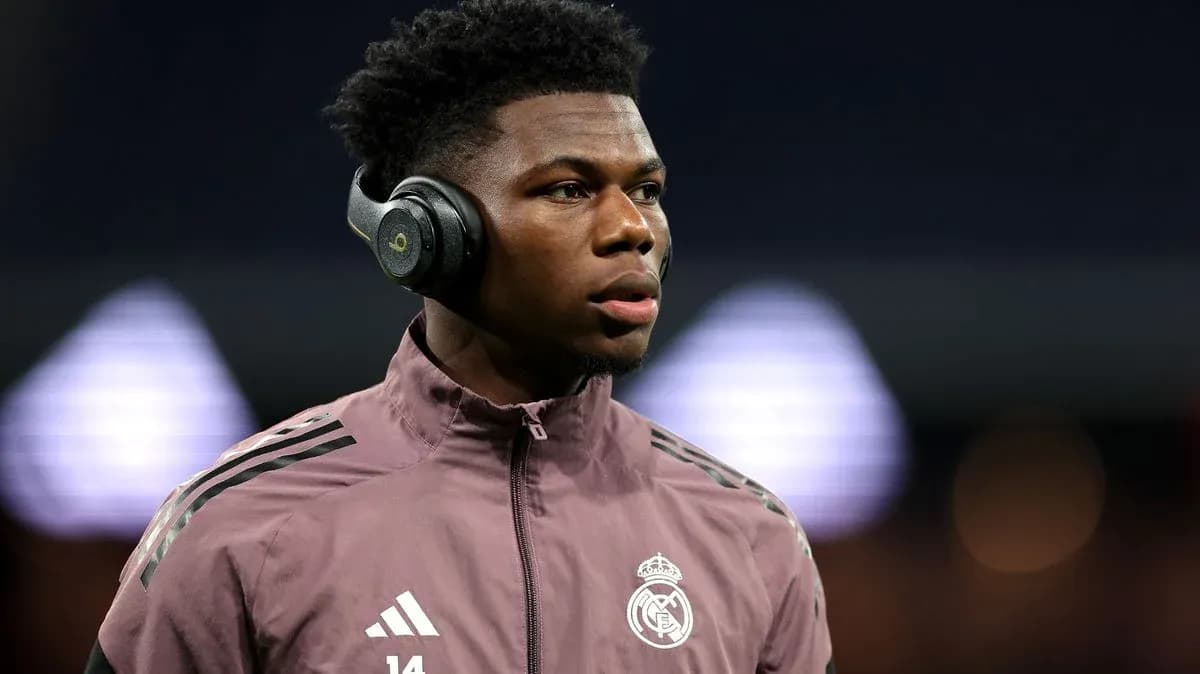 Player wearing headphones before match warm-up