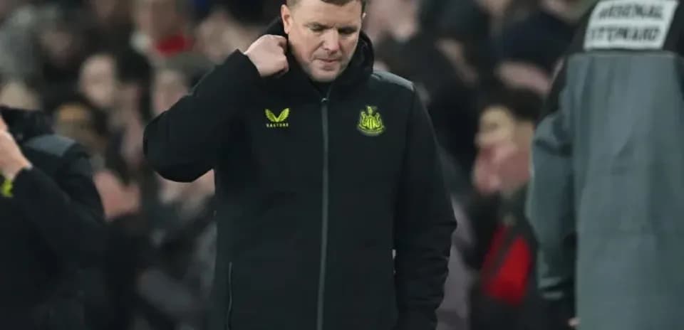 Newcastle United manager walking off the pitch