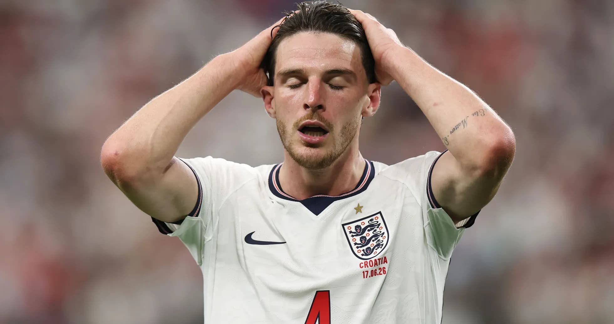 Player with hands on head during match