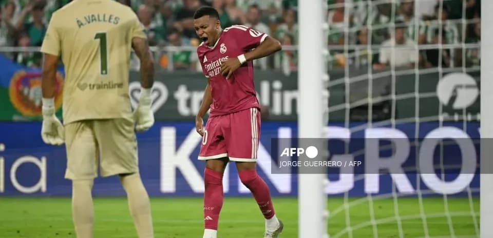 Real Madrid player reacting during match against goalkeeper