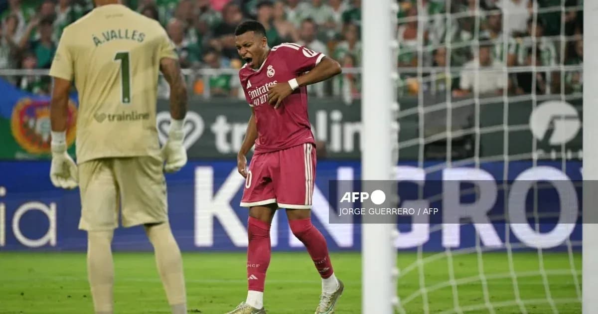 Real Madrid player reacting during match against goalkeeper