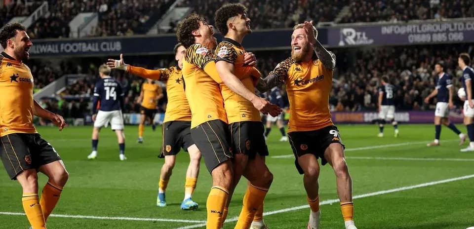 Wolverhampton players celebrating a goal on field