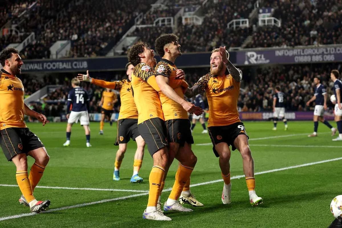 Wolverhampton players celebrating a goal on field