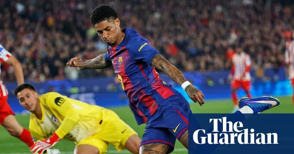 Barcelona player shooting at goal with goalkeeper nearby