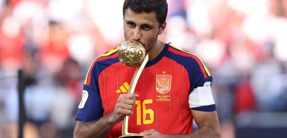 Player holding trophy after winning the tournament