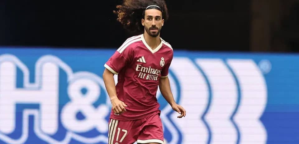 Player running on the field in pink jersey