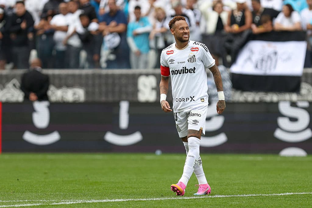 Player in white jersey celebrating during match