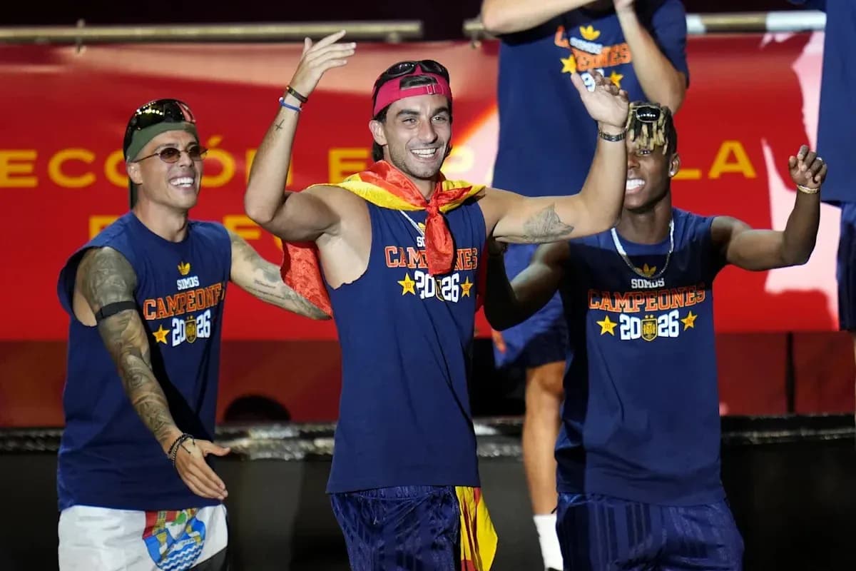 Players celebrating with medals on stage