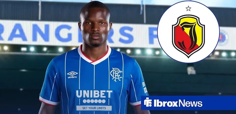 Player in blue Rangers kit with logo and text