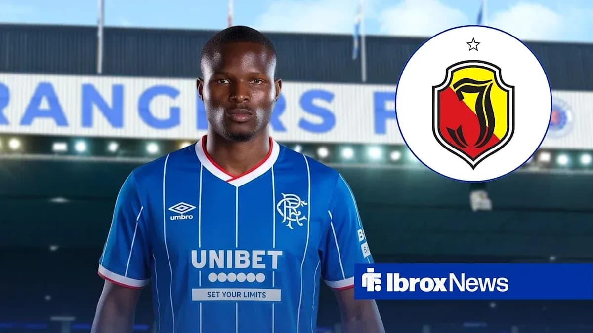 Player in blue Rangers kit with logo and text