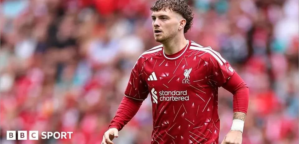 Liverpool player running on the pitch during match