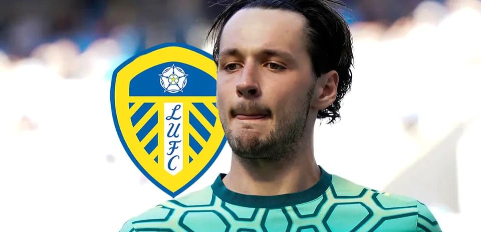 Goalkeeper in green jersey with Leeds United logo