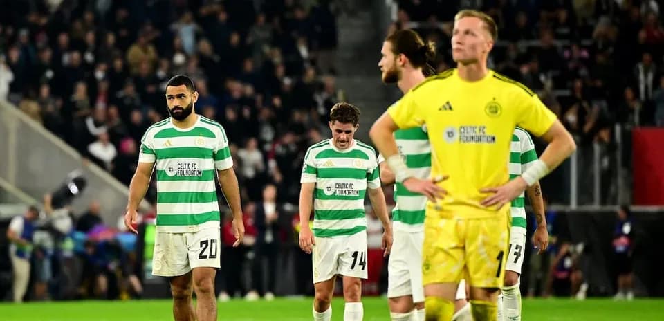 Celtic players walking off the field after match