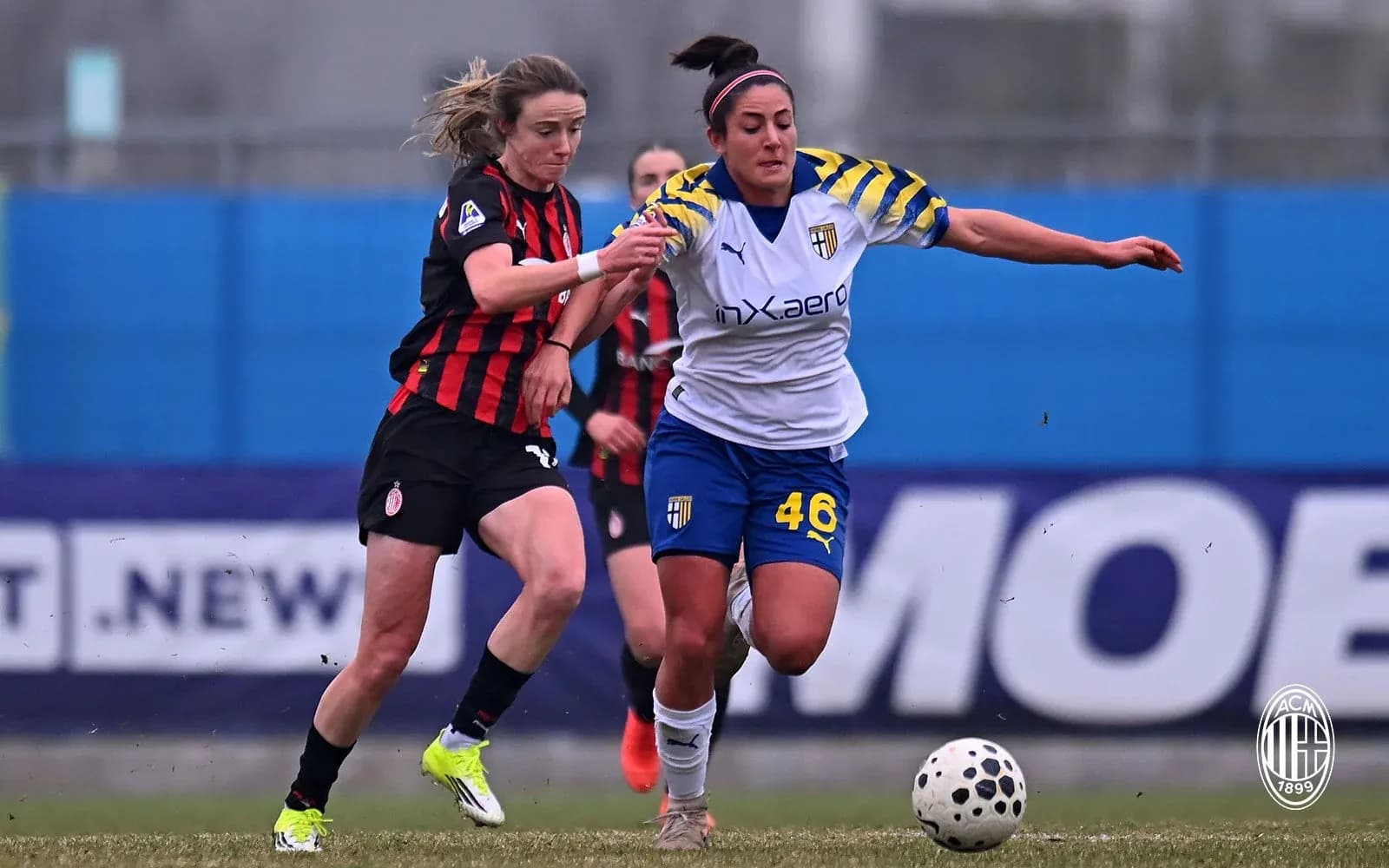 AC Milan and Parma players contesting for the ball