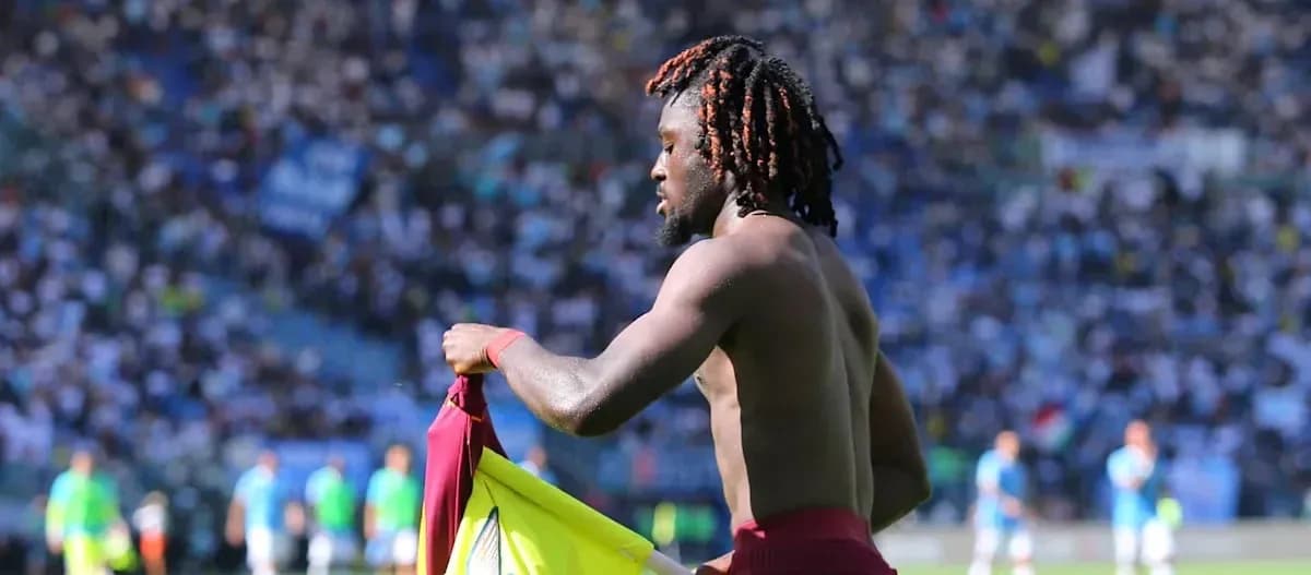 Player removing jersey during match in stadium