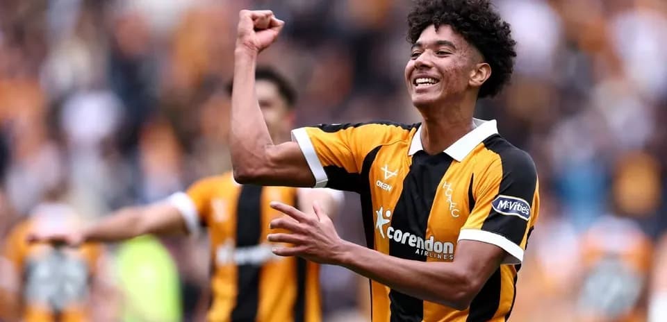 Player celebrating a goal in team uniform