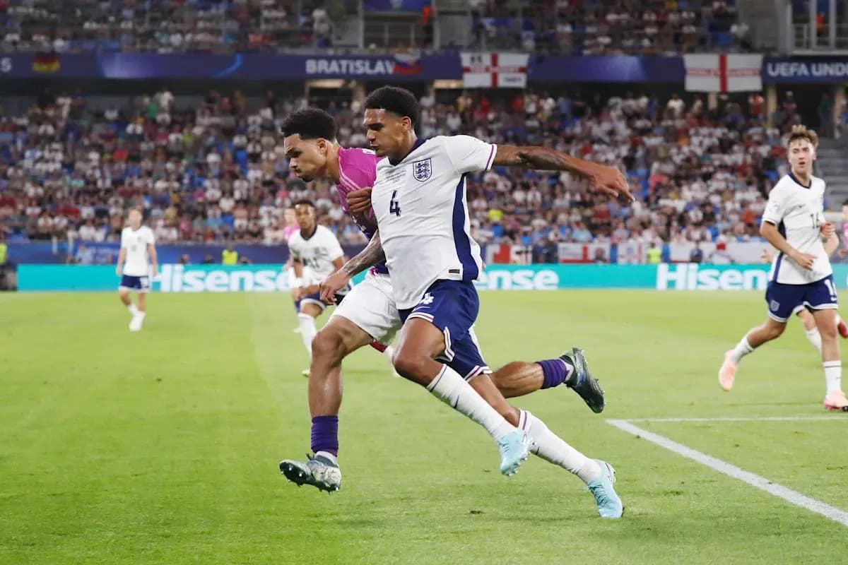 Two players contesting the ball during a match