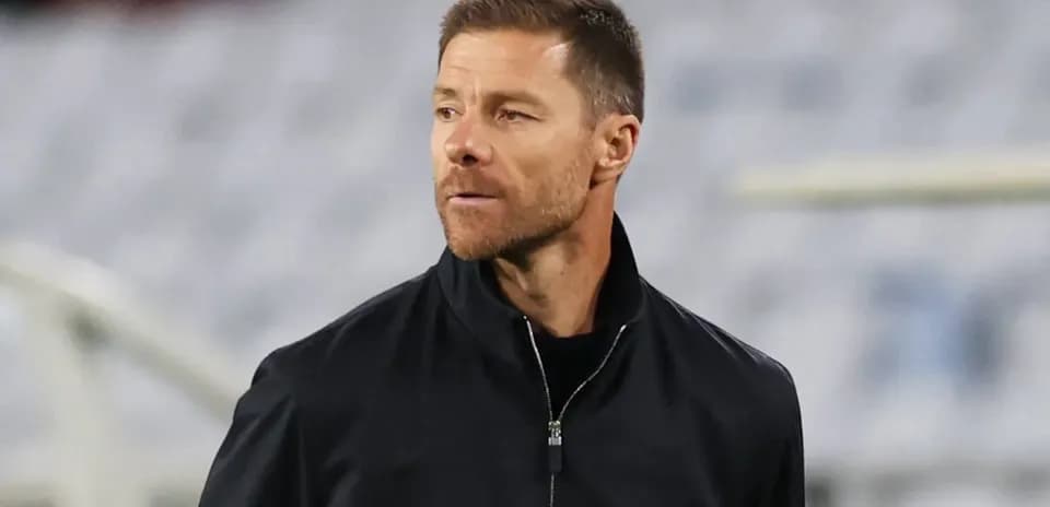 Coach observing the match from the sidelines