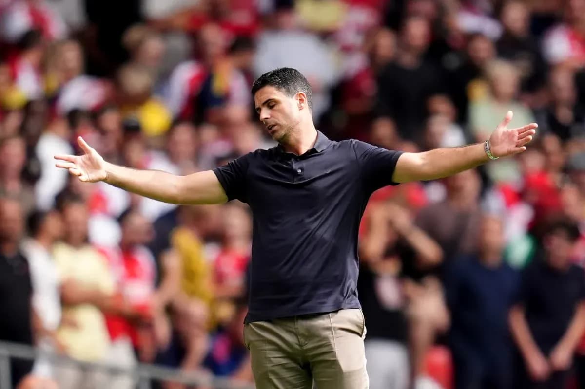 Coach gesturing to crowd during match