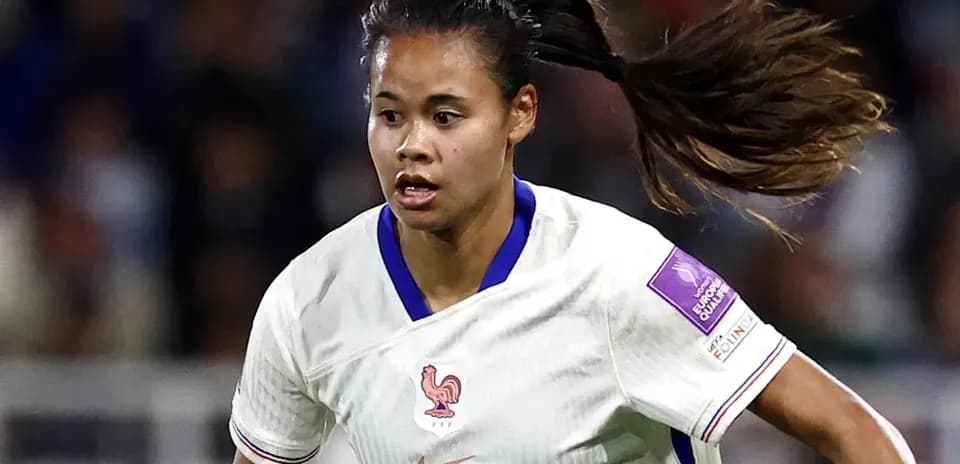 Player in white jersey sprinting during match