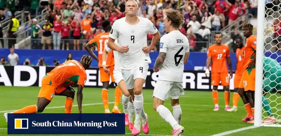 Players celebrating a goal during a match