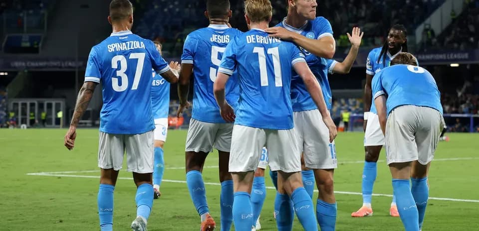 Napoli players celebrating during UEFA Champions League match