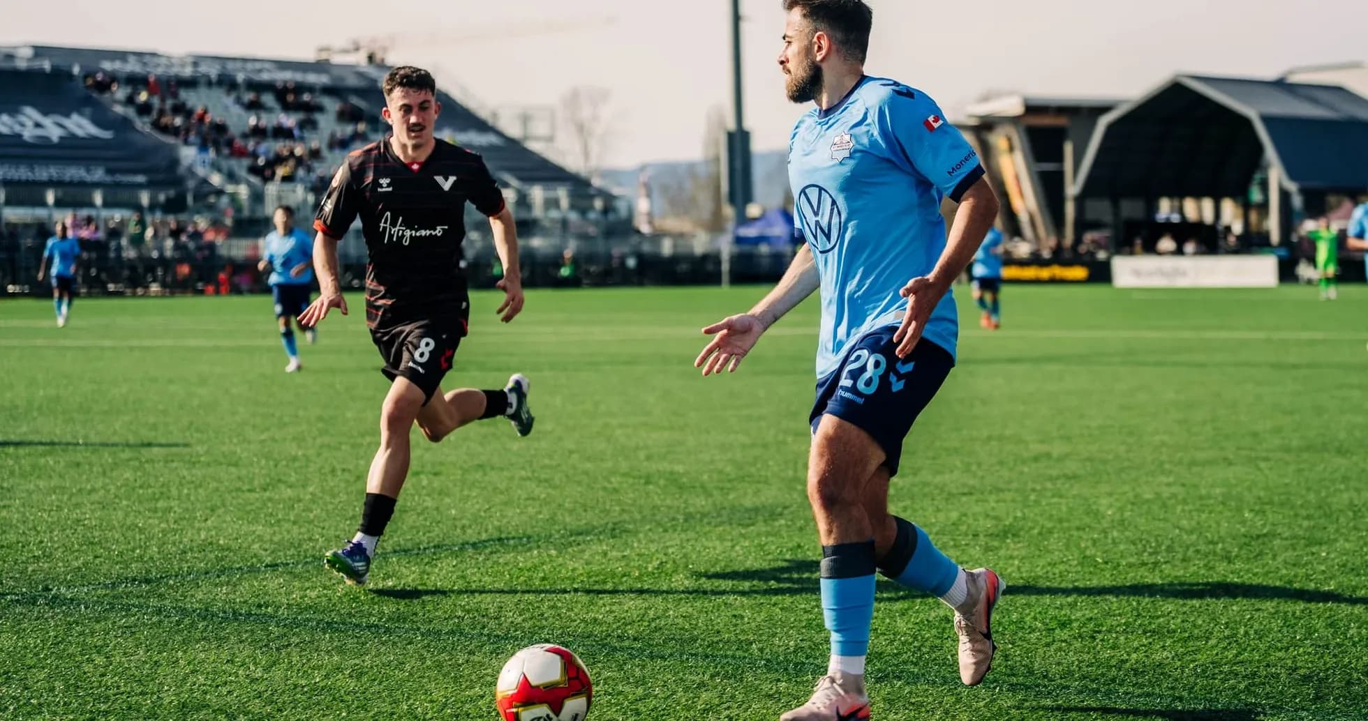 Player dribbling during HFX vs Vancouver match