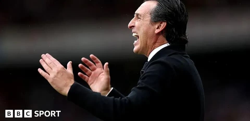 Manager celebrating and directing players on sideline
