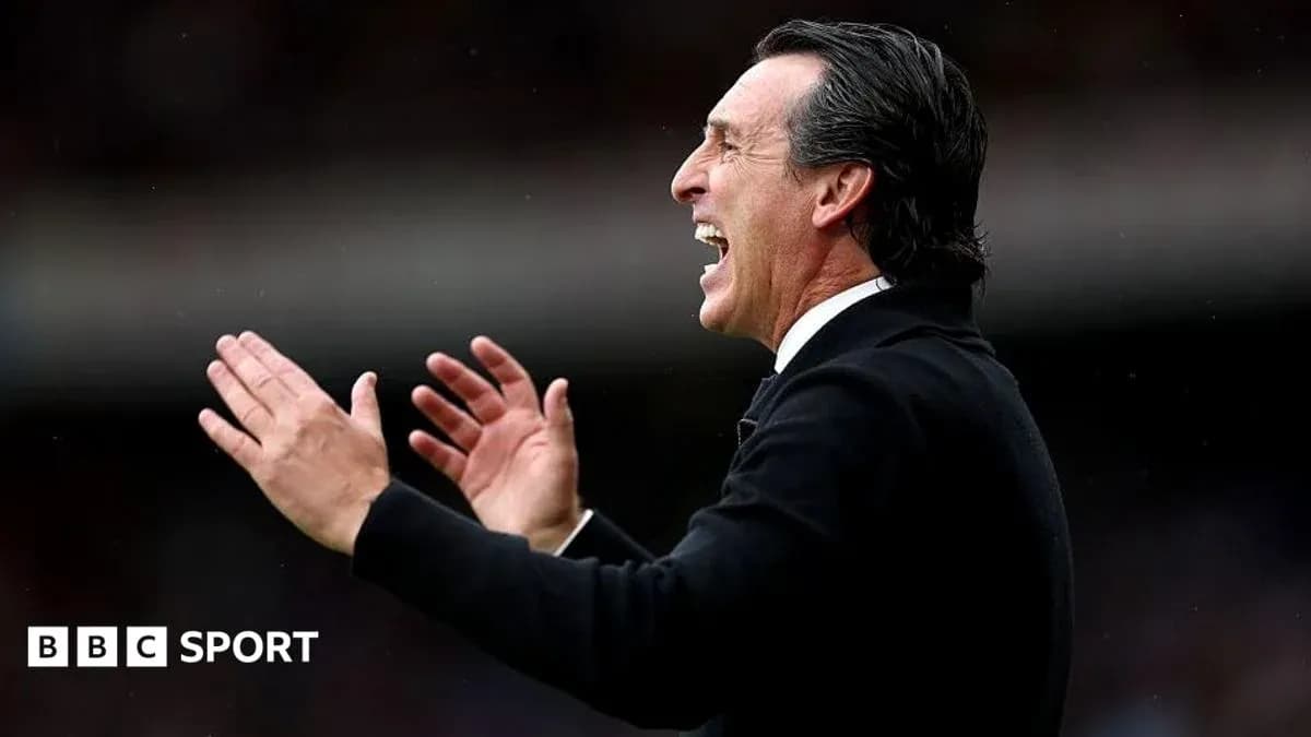 Manager celebrating and directing players on sideline