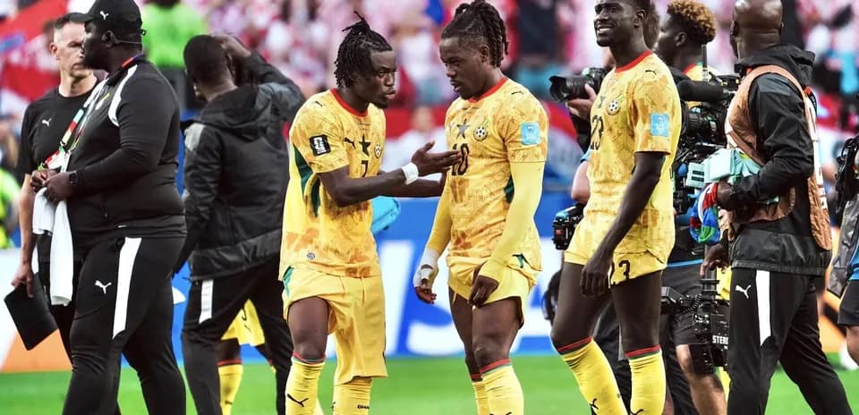 Ghana players discussing during World Cup match