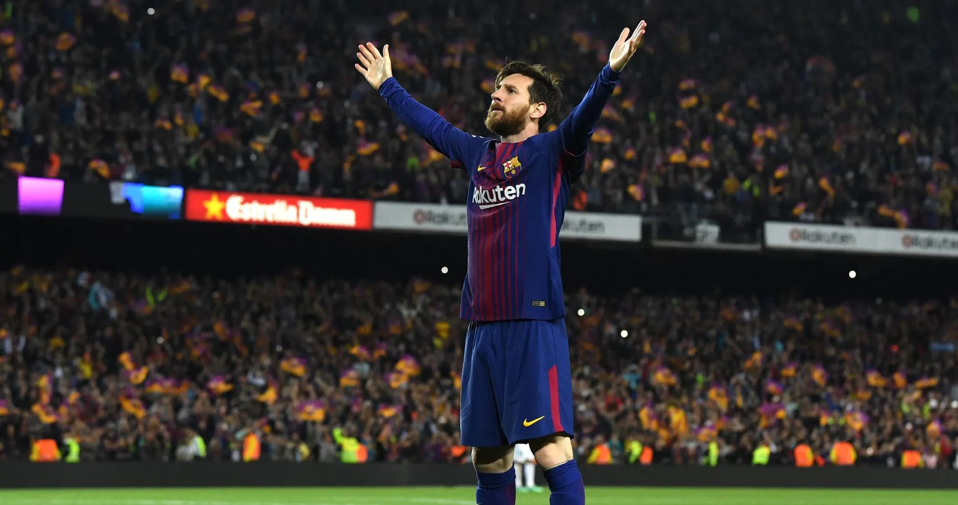 Player celebrating in front of cheering crowd