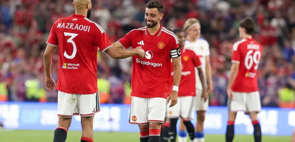 Bruno Fernandes and Mazraoui celebrating during match